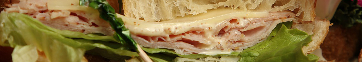 Eating Italian Pizza Sandwich at Chesapeake Pizza restaurant in Chesapeake, VA.